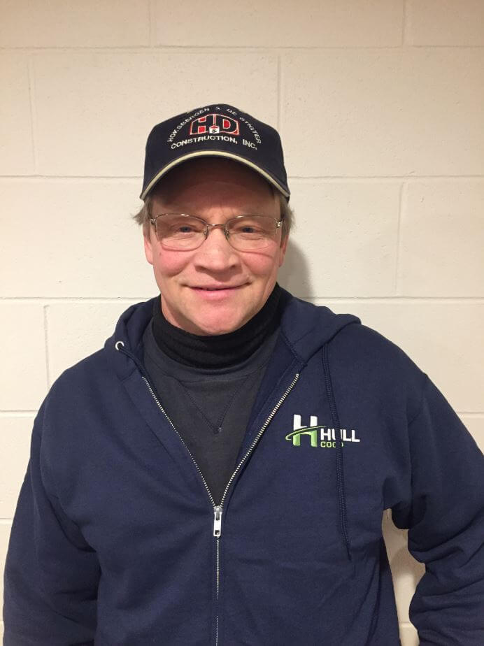 A portrait of Merrill Nettinga, member of the Board of Directors for Hull Coop in Hull, IA.